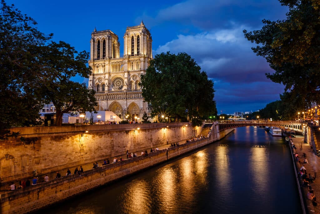 Notre Dame de Paris Cathedral and Seine River in the Evening Paris France